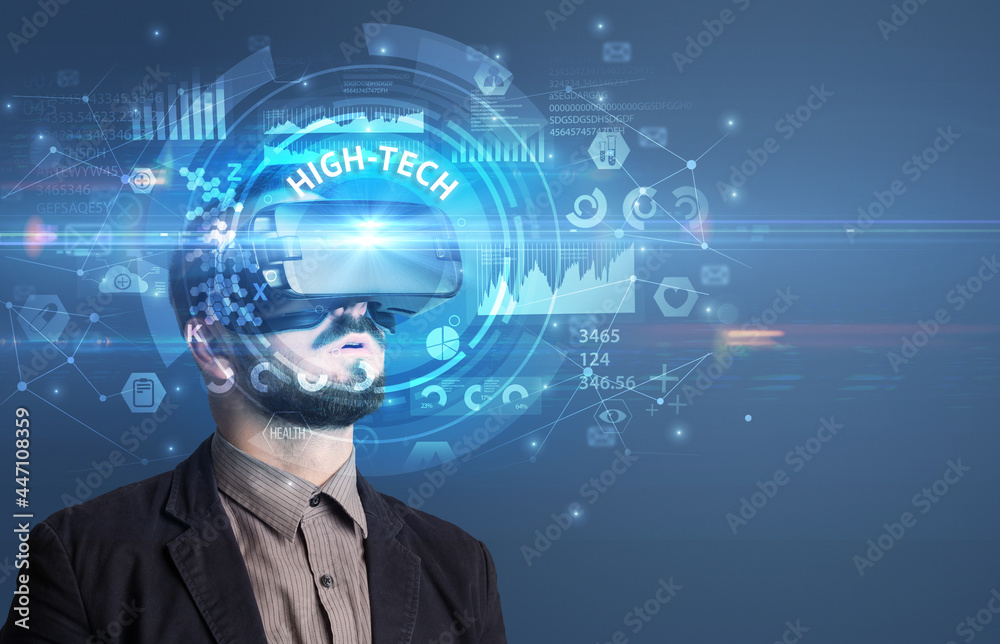 Businessman looking through VR glasses Businessman looking through VR glasses