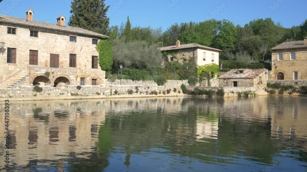 Geothermal pool and hot spring in Tuscany, Italy. Bagno Vignoni thermal pond in the morning with no people. Geothermal pool and hot spring in Tuscany, Italy. Bagno Vignoni thermal pond in the morning with no people.
