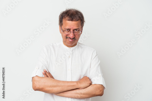 Middle aged indian man isolated on white background unhappy looking in camera with sarcastic expression.