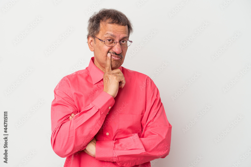 Middle aged indian man isolated on white background unhappy looking in camera with sarcastic expression. Middle aged indian man isolated on white background unhappy looking in camera with sarcastic expression.