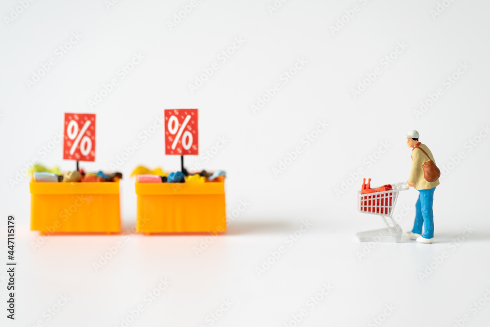 Miniature people Family Father Mother and children go shopping buying supplies supermarket mart grocery things using for internet online marketing Credit Card spending money department store business Miniature people Family Father Mother and children go shopping buying supplies supermarket mart grocery things using for internet online marketing Credit Card spending money department store business