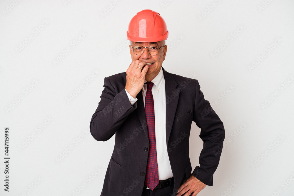 Senior american arquitech man isolated on white background biting fingernails, nervous and very anxious. Senior american arquitech man isolated on white background biting fingernails, nervous and very anxious.
