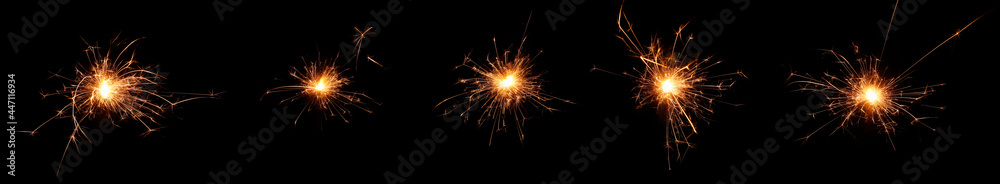 gold fireworks sparks isolated on a black background
