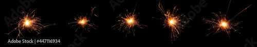 gold fireworks sparks isolated on a black background