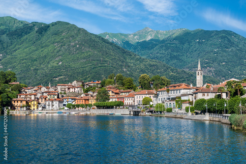 Beautiful Italian bathing lake with clear waters. Lake Mergozzo and the picturesque town of Mergozzo, valle Ossola in the province of Verbano Cusio Ossola in Piedmont region, Italy