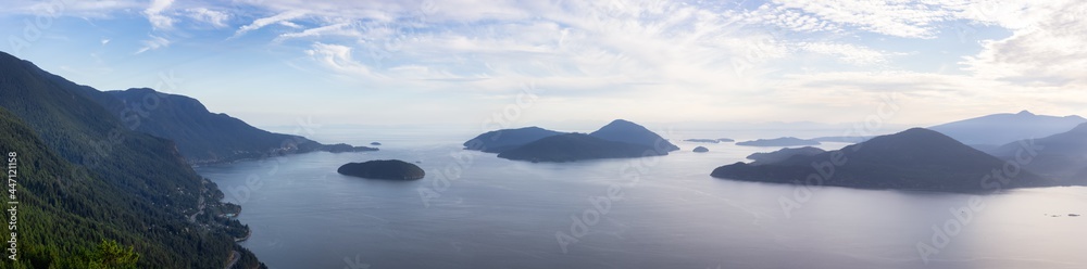 Tunnel Bluffs Hike, in Howe Sound, North of Vancouver, British Columbia, Canada. Panoramic Canadian Mountain Landscape View from the Peak during sunny summer sunset.