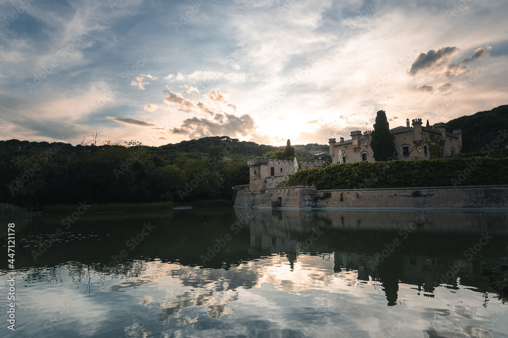 A lake, a castle and the sunset