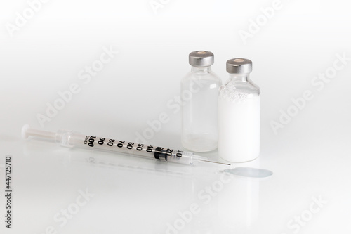 Needle, fluid and two vials