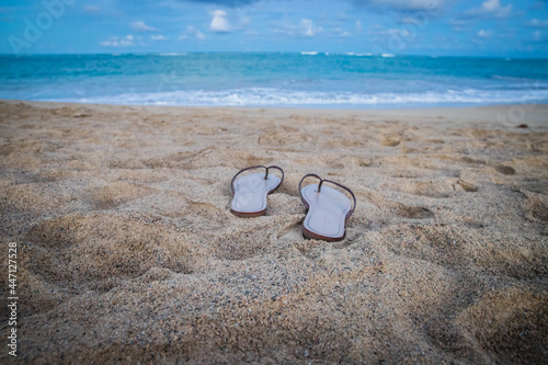 flip flops on the beach