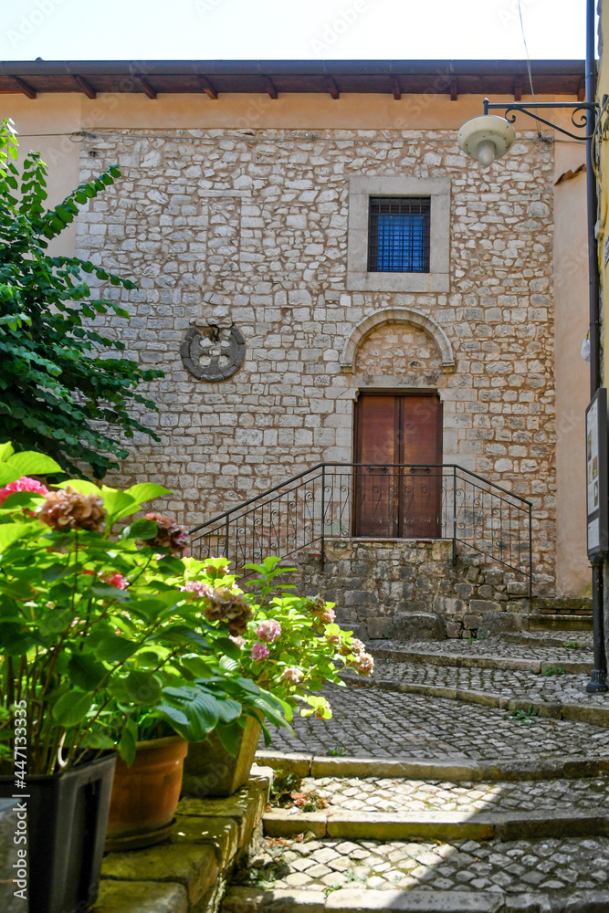 The facade of an old house in Maenza, a medieval town in the Lazio region, Italy.