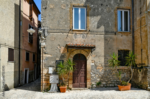 The facade of an old house in Maenza, a medieval town in the Lazio region, Italy.