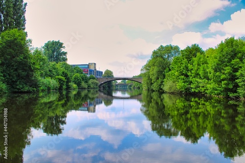 Rheine, Germany on 10.07.2021: The city center of Rheine seen from a boat on Ems river photo