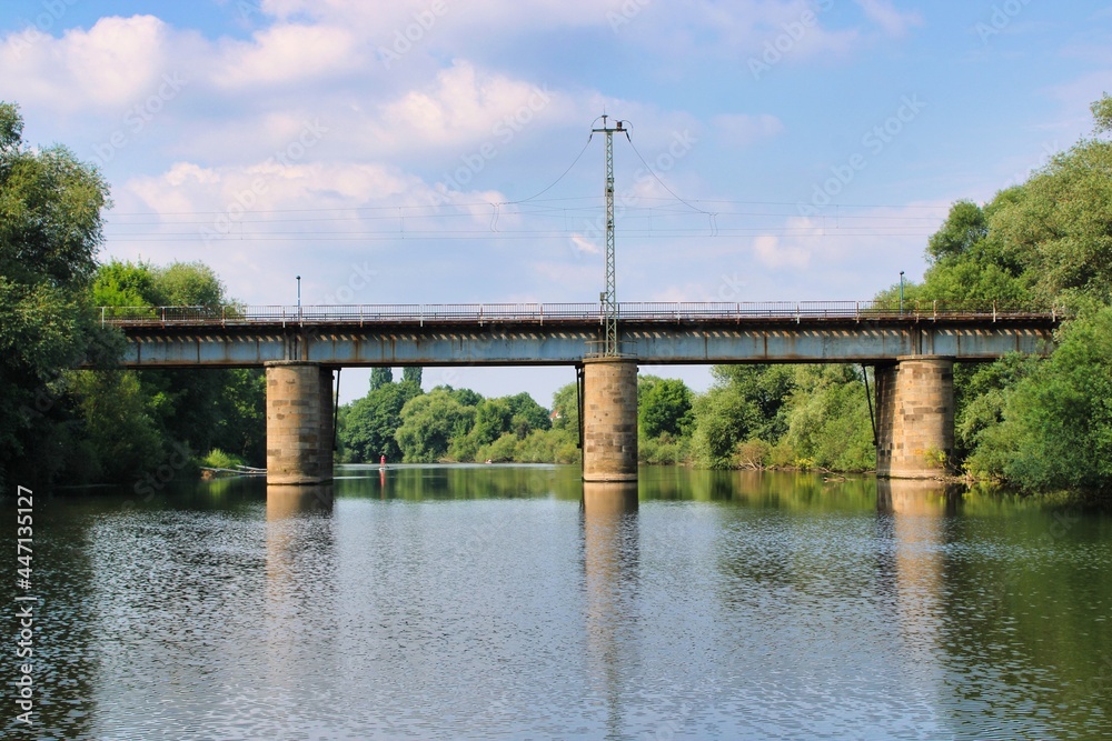 Fototapeta premium Soldatenbrücke bridge crossing Ems river close to the city of Rheine in Germany