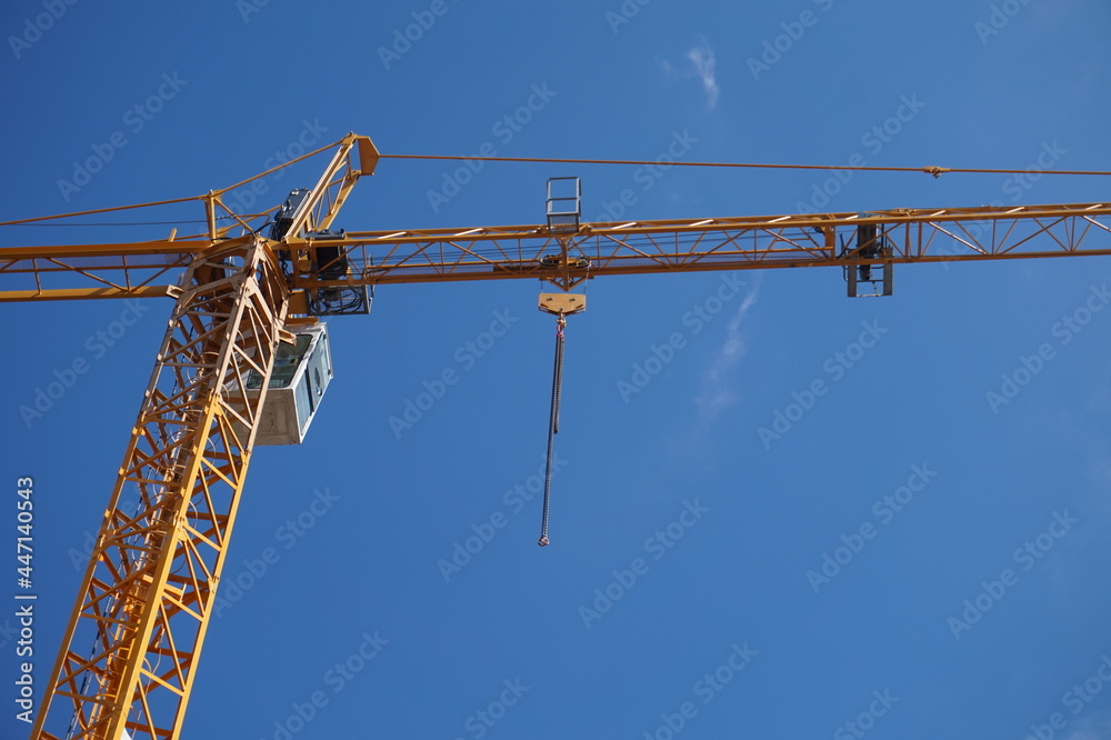 construction crane on blue sky background construction crane on blue sky background