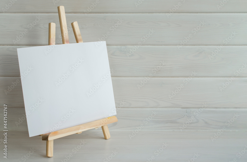 easle for painting in studio against white background Stock Photo