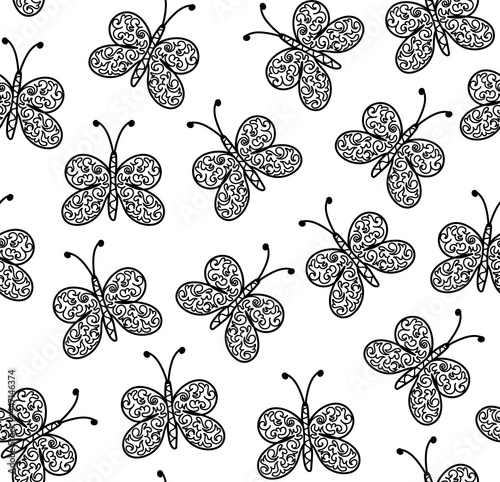 Decorative nature vector seamless pattern with hand drawn butterflies with ornamental wings photo