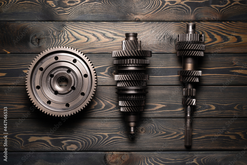 Disassembled parts of car gearbox flat lay background. Disassembled parts of car gearbox flat lay background.