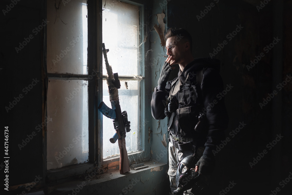 Naklejka premium Mercenaty soldier with a rifle concept.