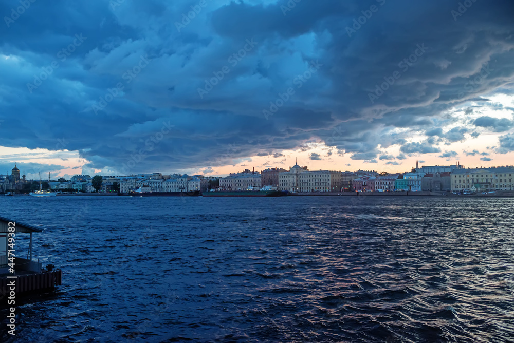Night view of the river and the old buildings of the city center of St. Petersburg