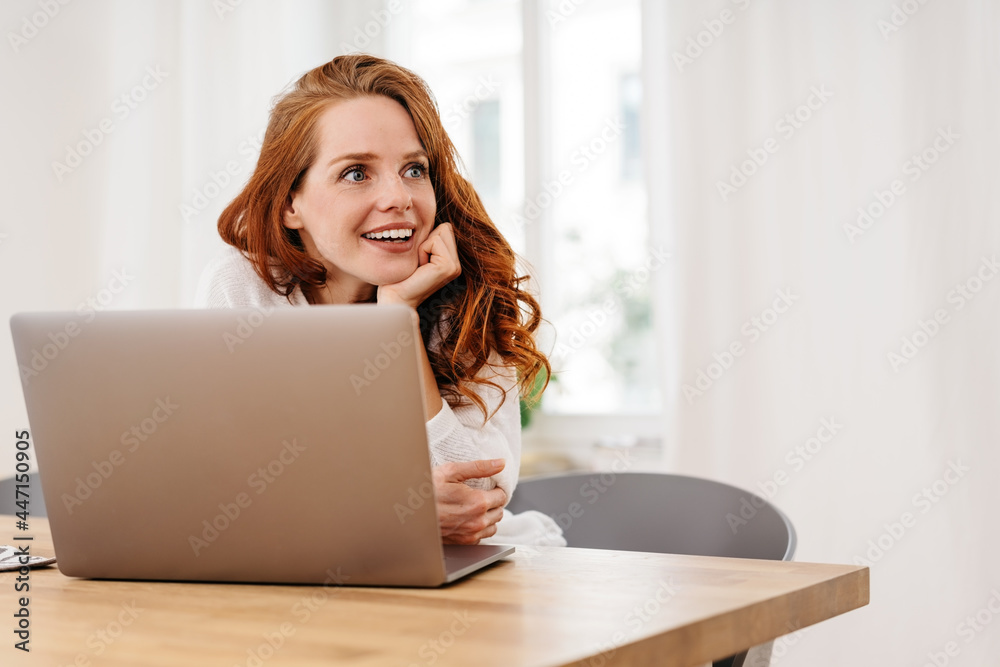 Mesmerised or infatuated young woman staring off to the side