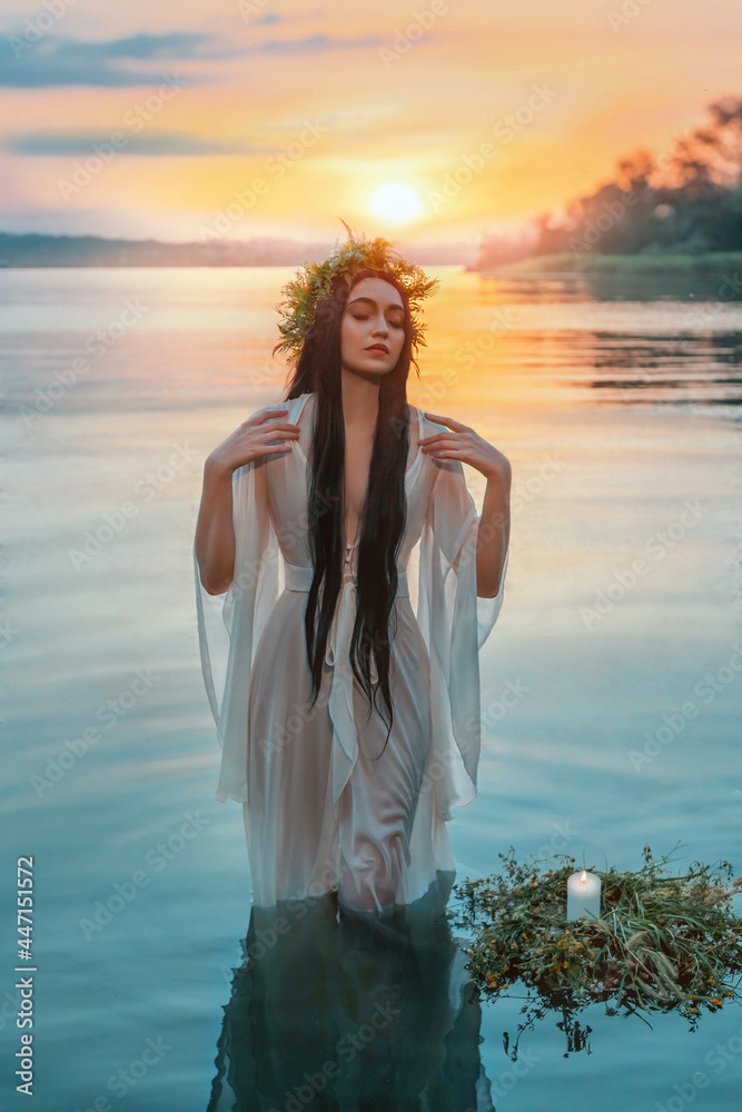 Φωτογραφία Pagan girl Slavic goddess emerges from water lake ritual flower wreaths float, candles burning