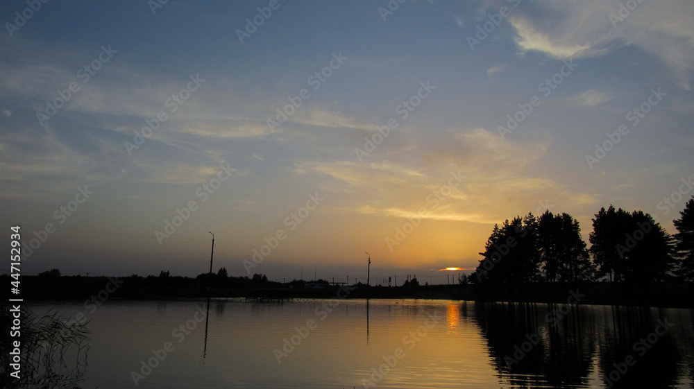 Landscape of the lake and the sky at sunset
