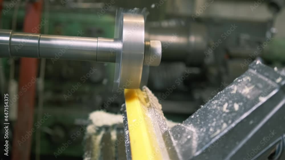 Closeup. A milling cutter on a horizontal milling machine processes a