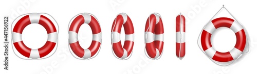 Set of red life buoys. Rescue belts, inflatable rubbers lifebuoys ring with rope for help and safety photo