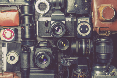 Slika na platnu Old outdated cameras, lenses and exposure meters