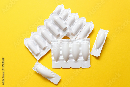 Vaginal suppositories for the treatment of female diseases. Concept of female sexual health and disease prevention photo