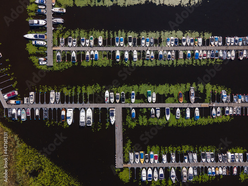Aerial shots of a pier with boats in Ekoln Lake, Sweden