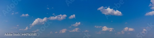 Panorama of blue sky with white clouds