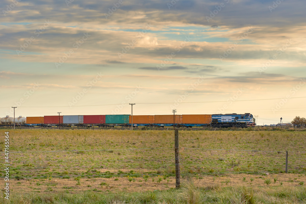 freighter train rural landscape sky cloud grass