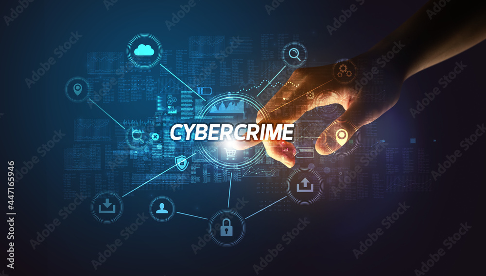 Hand touching cybersecurity button Hand touching cybersecurity button