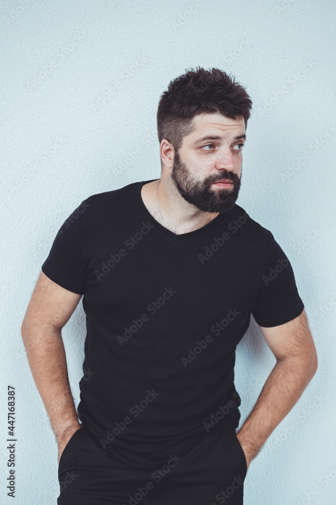 Young beard man posing in the street Young beard man posing in the street