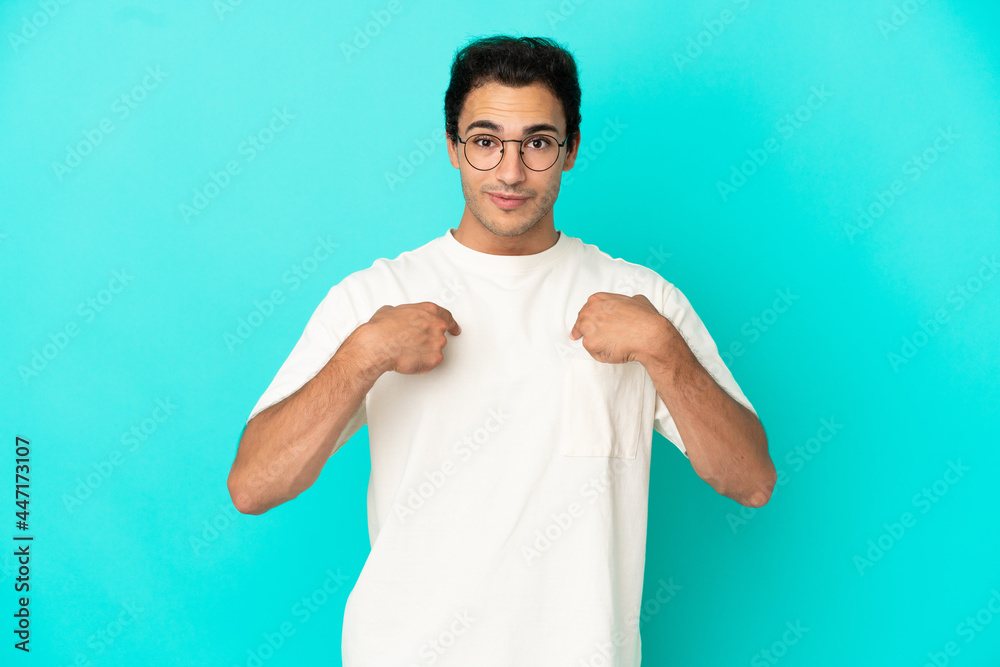 Caucasian handsome man over isolated blue background with surprise facial expression Caucasian handsome man over isolated blue background with surprise facial expression