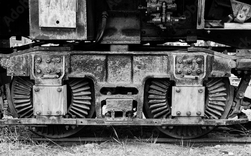 Train engine suspension in black and white