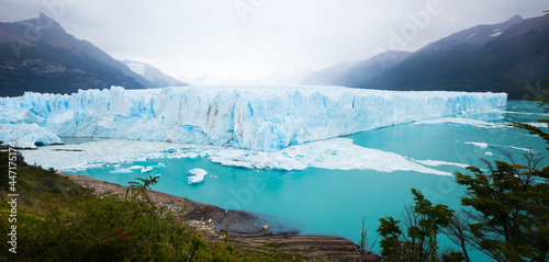 Glacier Perito Moreno (Glaciar Perito Moreno) and Andes mountains on sunny summer day. Patagonia, Argentina, Chile, Andes