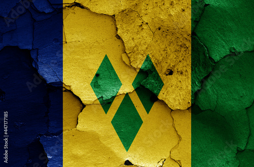 flag of St Vincent and the Grenadines painted on cracked wall photo