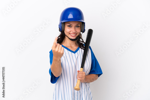 Baseball Russian girl player with helmet and bat isolated on white background doing coming gesture