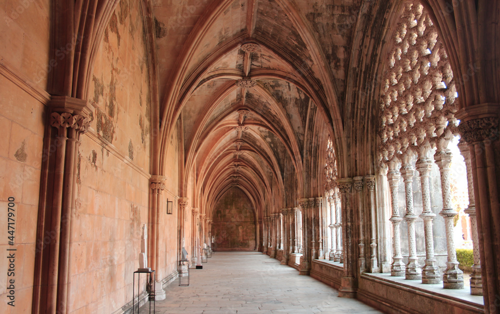 Stone arches at the Gothic Cloister inside the Batalha Monastery in central Portugal, a UNESCO World Heritage Site