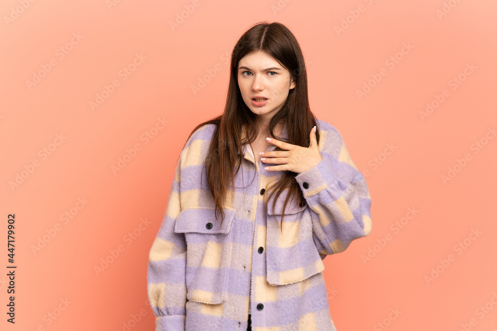 Young Ukrainian girl isolated on pink background pointing to oneself Young Ukrainian girl isolated on pink background pointing to oneself