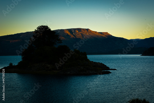 the last ray of sun on the mountain