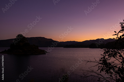 
sunset behind the mountain