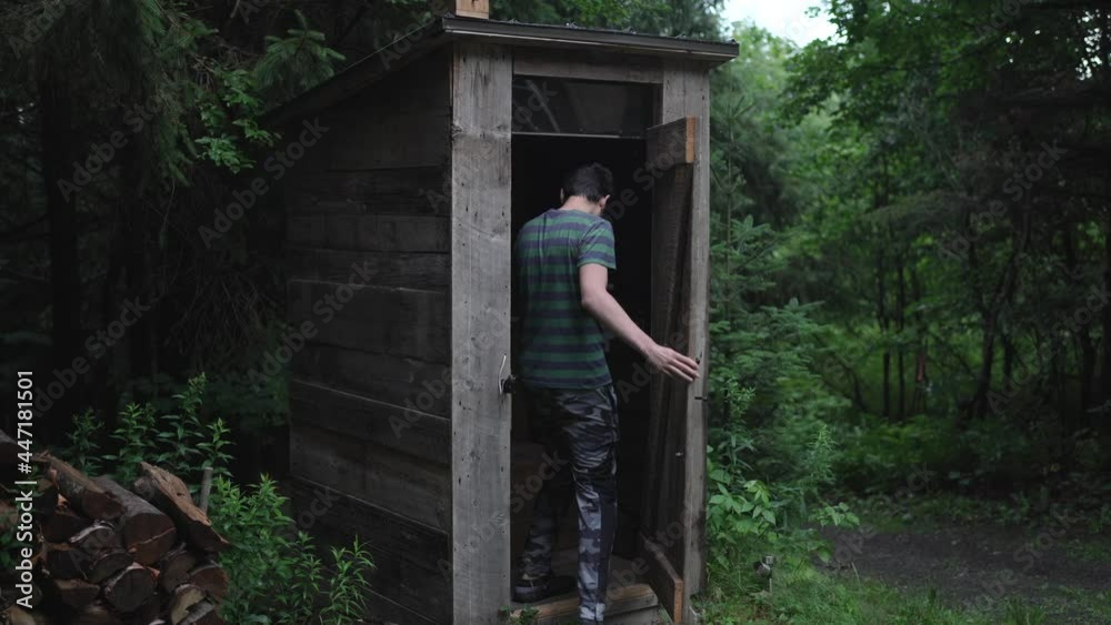 Using a Wooden Dry Toilet in the Forest WC Using a Wooden Dry Toilet in the Forest WC