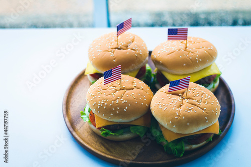 American symbol background with hamberger flag, food concept. photo