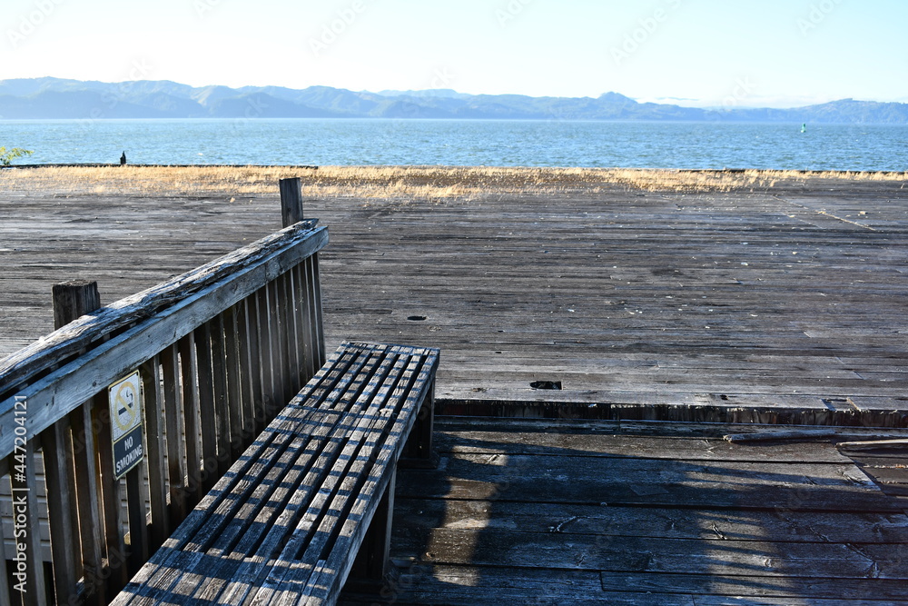 Fototapeta premium Old wooden bench on closed dock.