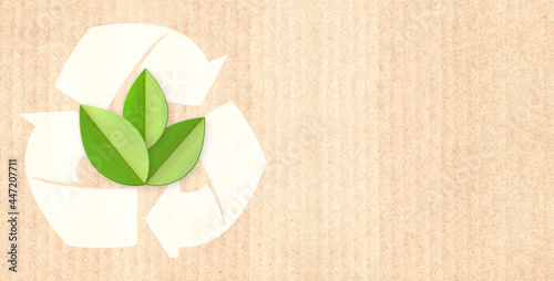 Paper cardboard background with green leaves in paper cut style