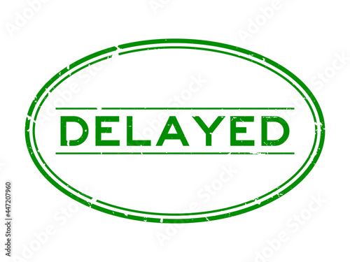 Grunge green delayed word oval rubber seal stamp on white background
