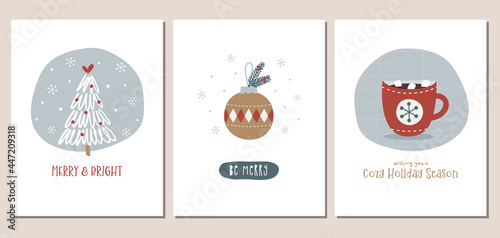 Set of winter holiday greeting cards with hand drawn Christmas tree, ornament, and hot chocolate in trendy neutral colors.